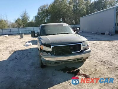 Zdjęcie 10 z 14 samochodu: 2000 GMC NEW SIERRA C2500 VIN:1GTFC29U6YE354641 - miniatura
