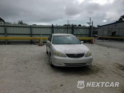 Zdjęcie 13 z 13 samochodu: 2004 TOYOTA CAMRY LE VIN:4T1BE30K64U348490 - miniatura