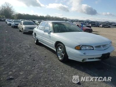Zdjęcie 13 z 13 samochodu: 1999 PONTIAC BONNEVILLE SE VIN:1G2HX52K2XH233680 - miniatura