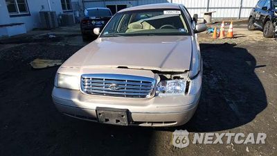 Zdjęcie 13 z 13 samochodu: 1998 FORD CROWN VICTORIA LX VIN:2FAFP74W9WX187901 - miniatura