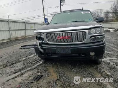 Zdjęcie 14 z 14 samochodu: 2004 GMC YUKON DENALI VIN:1GKEK63U54J135982 - miniatura
