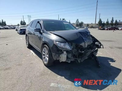 Zdjęcie 14 z 14 samochodu: 2016 LINCOLN MKT VIN:2LMHJ5FK4GBL00395 - miniatura