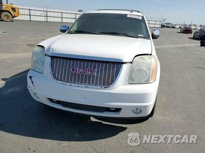 Zdjęcie 14 z 14 samochodu: 2010 GMC YUKON SLT VIN:1GKUKCE00AR101580 - miniatura
