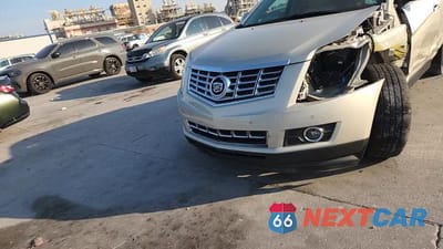 Zdjęcie 14 z 14 samochodu: 2015 CADILLAC SRX PREMIUM COLLECTION VIN:3GYFNDE34FS521840 - miniatura