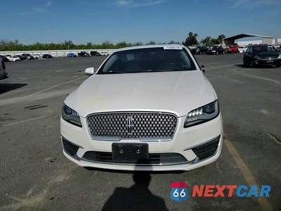 Zdjęcie 13 z 13 samochodu: 2017 LINCOLN MKZ HYBRID RESERVE VIN:3LN6L5MUXHR646598 - miniatura