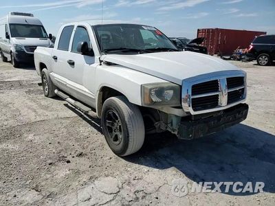 Zdjęcie 13 z 13 samochodu: 2005 DODGE DAKOTA QUAD LARAMIE VIN:1D7HE58N95S138333 - miniatura