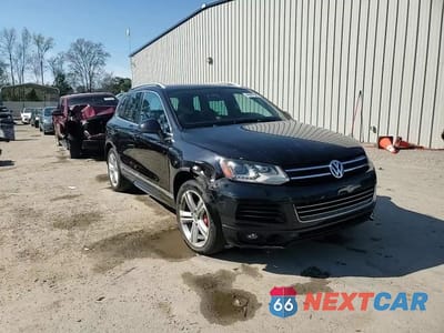 Zdjęcie 14 z 14 samochodu: 2014 VOLKSWAGEN TOUAREG TDI VIN:WVGDP9BPXED007867 - miniatura