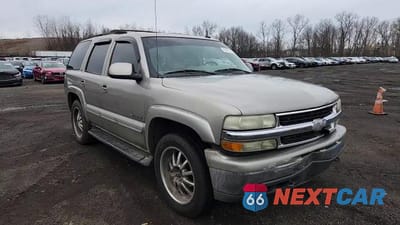 Zdjęcie 13 z 13 samochodu: 2002 CHEVROLET TAHOE K1500 VIN:1GNEK13ZX2R274375 - miniatura