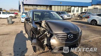 Zdjęcie 14 z 14 samochodu: 2016 MAZDA CX-5 GT VIN:JM3KE4DY4G0771757 - miniatura