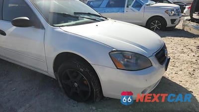 Zdjęcie 13 z 13 samochodu: 2002 NISSAN ALTIMA AUTOMATIC VIN:1N4AL11E32C209526 - miniatura