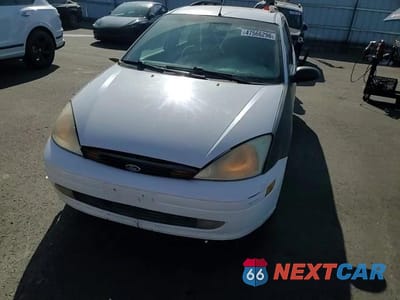 Zdjęcie 13 z 13 samochodu: 2001 FORD FOCUS SE VIN:1FAFP36351W269138 - miniatura