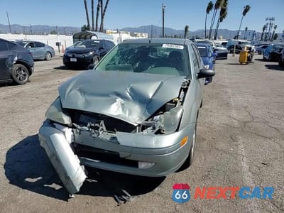 Zdjęcie 14 z 14 samochodu: 2004 FORD FOCUS ZX5 VIN:3FAFP37Z74R110972 - miniatura