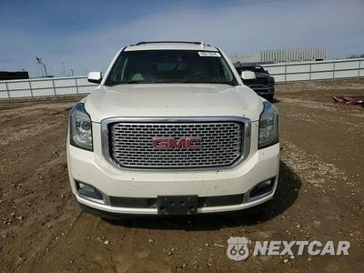 Zdjęcie 14 z 14 samochodu: 2015 GMC YUKON XL DENALI VIN:1GKS2JKJ1FR720446 - miniatura