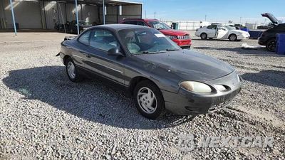 Zdjęcie 13 z 13 samochodu: 2002 FORD ESCORT ZX2 VIN:3FAFP11342R199258 - miniatura