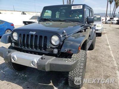 Zdjęcie 14 z 14 samochodu: 2015 JEEP WRANGLER UNLIMITED SAHARA VIN:1C4BJWEG3FL530761 - miniatura