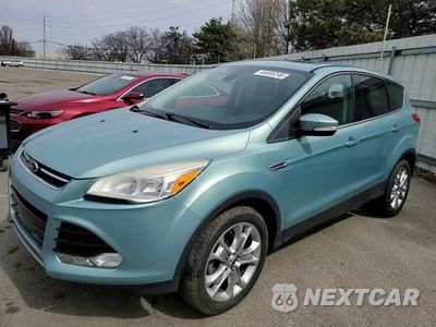 Zdjęcie 14 z 14 samochodu: 2013 FORD ESCAPE SEL VIN:1FMCU0HX1DUB99394 - miniatura
