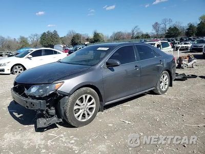 Zdjęcie 14 z 14 samochodu: 2014 TOYOTA CAMRY LE VIN:4T4BF1FK0ER438766 - miniatura