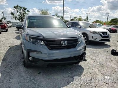 Zdjęcie 14 z 14 samochodu: 2022 HONDA PILOT SE VIN:5FNYF5H23NB032387 - miniatura