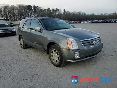 Zdjęcie 14 z 14 samochodu: 2004 CADILLAC SRX VIN:1GYDE637540119144 - miniatura
