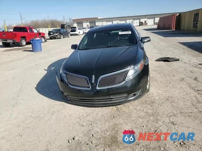 Zdjęcie 13 z 13 samochodu: 2014 LINCOLN MKS VIN:1LNHL9FT2EG610119 - miniatura