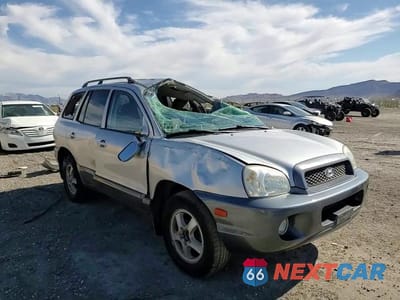 Zdjęcie 12 z 15 samochodu: 2003 HYUNDAI SANTA FE GLS VIN:KM8SC13D63U461796 - miniatura