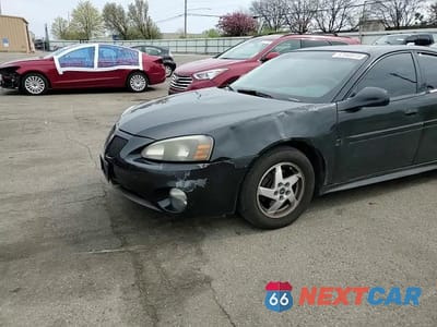 Zdjęcie 11 z 14 samochodu: 2004 PONTIAC GRAND PRIX GT2 VIN:2G2WS522741148130 - miniatura