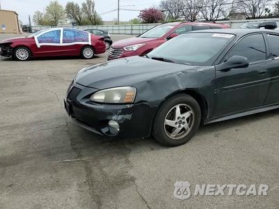 Zdjęcie 11 z 14 samochodu: 2004 PONTIAC GRAND PRIX GT2 VIN:2G2WS522741148130 - miniatura
