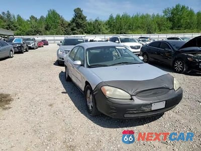 Zdjęcie 10 z 14 samochodu: 2001 FORD TAURUS SES VIN:1FAFP55U91G196212 - miniatura