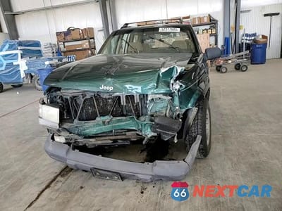 Zdjęcie 12 z 15 samochodu: 1997 JEEP GRAND CHEROKEE LAREDO VIN:1J4GZ58S0VC569017 - miniatura