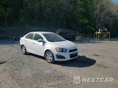 Zdjęcie 13 z 14 samochodu: 2014 CHEVROLET SONIC VIN:1G1JC5S89E4198453 - miniatura
