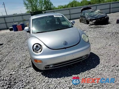 Zdjęcie 10 z 14 samochodu: 2000 VOLKSWAGEN NEW BEETLE GLS VIN:3VWCD21C8YM492675 - miniatura