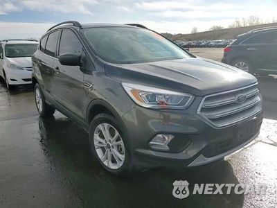Zdjęcie 14 z 14 samochodu: 2018 FORD ESCAPE SEL VIN:1FMCU9HDXJUB54525 - miniatura