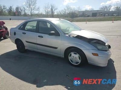 Zdjęcie 10 z 14 samochodu: 2003 FORD FOCUS LX VIN:1FAFP33P23W311601 - miniatura