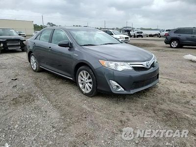 Zdjęcie 11 z 14 samochodu: 2013 TOYOTA CAMRY HYBRID VIN:4T1BD1FKXDU094717 - miniatura