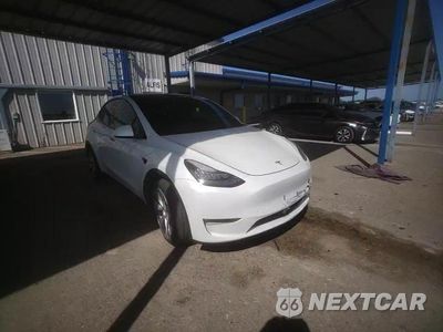 Zdjęcie 13 z 14 samochodu: 2022 TESLA MODEL Y VIN:7SAYGDEE9NF431927 - miniatura