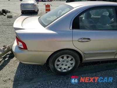 Zdjęcie 14 z 15 samochodu: 2004 KIA OPTIMA LX VIN:KNAGD126845321753 - miniatura