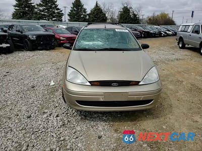 Zdjęcie 12 z 15 samochodu: 2000 FORD FOCUS SE VIN:1FAHP36P7YW219878 - miniatura