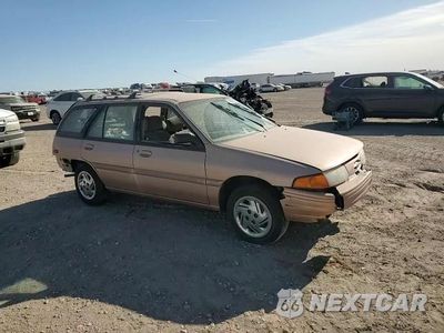 Zdjęcie 11 z 14 samochodu: 1994 FORD ESCORT LX VIN:3FARP15J6RR162793 - miniatura