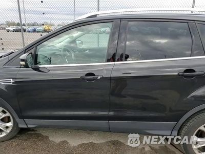 Zdjęcie 12 z 15 samochodu: 2014 FORD ESCAPE TITANIUM VIN:1FMCU9JX4EUC14440 - miniatura