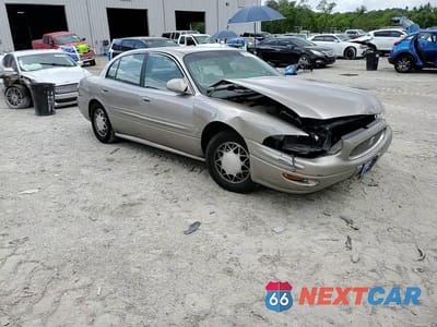 Zdjęcie 10 z 14 samochodu: 2001 BUICK LESABRE CUSTOM VIN:1G4HP54K614276230 - miniatura