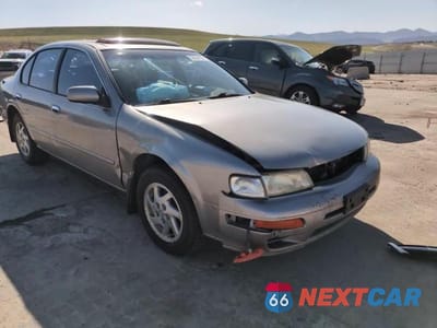 Zdjęcie 11 z 14 samochodu: 1999 NISSAN MAXIMA GLE VIN:JN1CA21A9XT707073 - miniatura