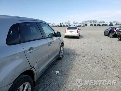 Zdjęcie 11 z 14 samochodu: 2015 MITSUBISHI OUTLANDER SPORT ES VIN:4A4AP3AW2FE052755 - miniatura