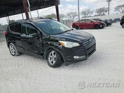 Zdjęcie 14 z 15 samochodu: 2016 FORD ESCAPE SE VIN:1FMCU0GX3GUB43902 - miniatura