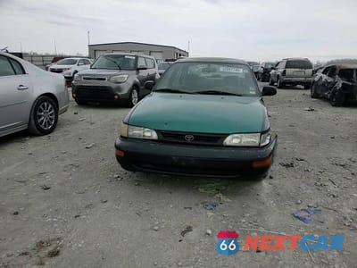 Zdjęcie 11 z 14 samochodu: 1997 TOYOTA COROLLA DX VIN:1NXBB02E8VZ519692 - miniatura