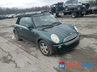 Zdjęcie 11 z 14 samochodu: 2007 MINI COOPER VIN:WMWRF33527TG16774 - miniatura