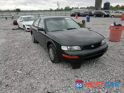 Zdjęcie 10 z 14 samochodu: 1996 NISSAN MAXIMA GLE VIN:JN1CA21D9TT185646 - miniatura