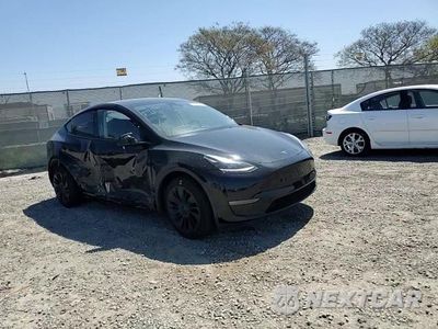 Zdjęcie 10 z 14 samochodu: 2023 TESLA MODEL Y VIN:7SAYGDEE5PA189136 - miniatura