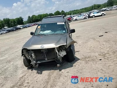 Zdjęcie 11 z 13 samochodu: 2002 NISSAN XTERRA XE VIN:5N1ED28T12C541446 - miniatura