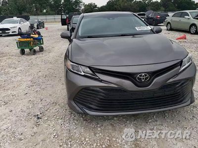 Zdjęcie 10 z 14 samochodu: 2020 TOYOTA CAMRY LE VIN:4T1C11AK1LU954801 - miniatura