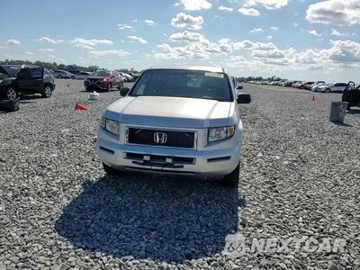 Zdjęcie 13 z 14 samochodu: 2007 HONDA RIDGELINE RTX VIN:2HJYK16317H501503 - miniatura